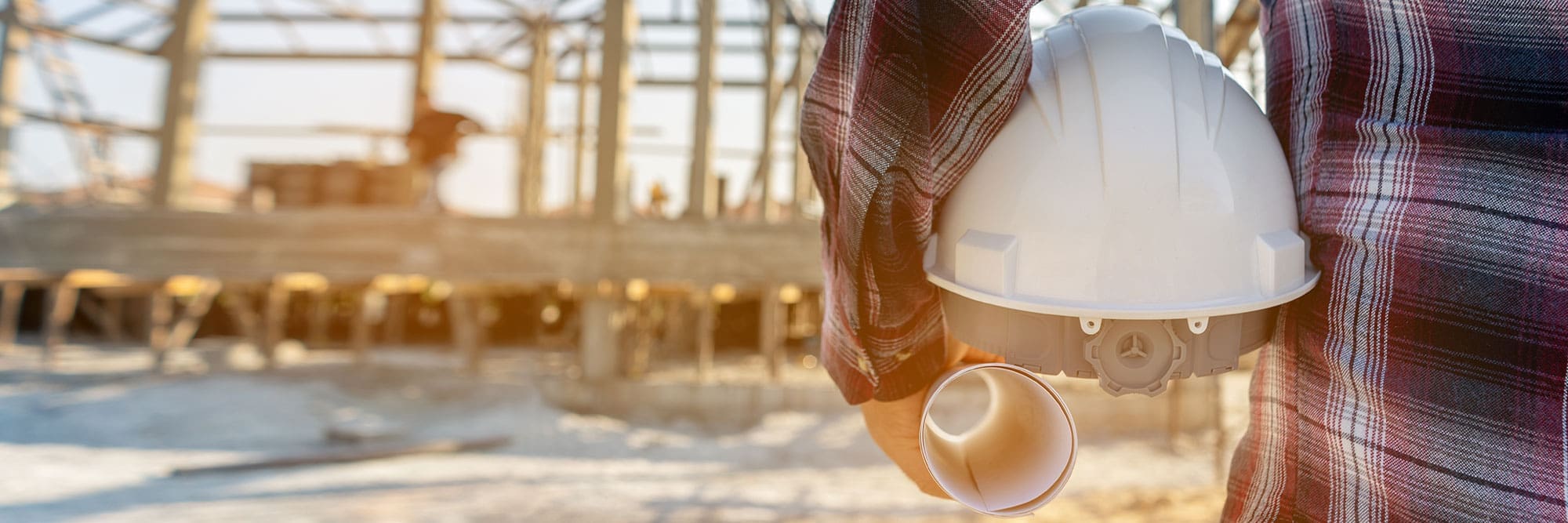 dramatic view of a constructor at a construction site