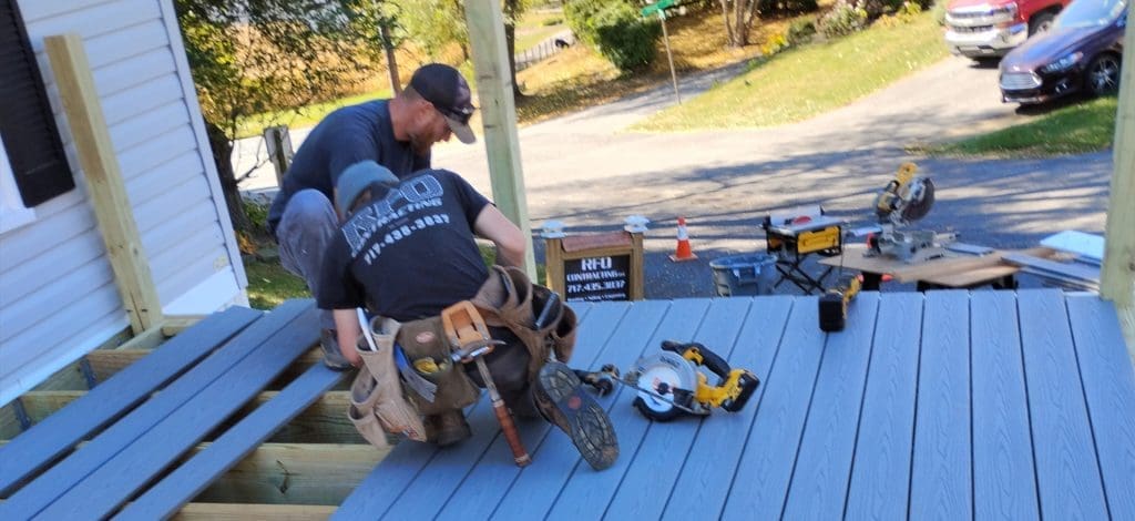 Contractors building a new deck.